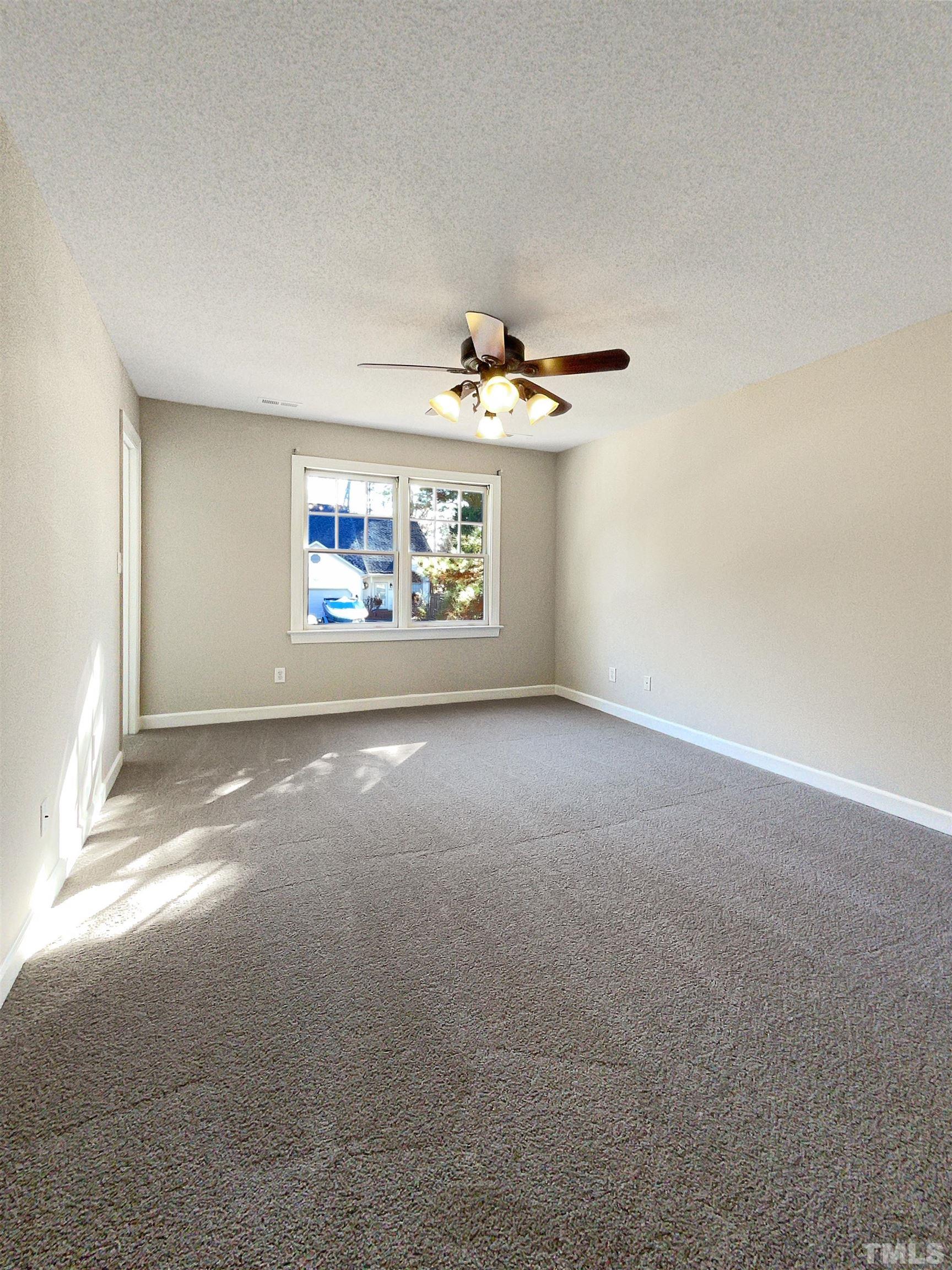 6017 Tarleton Court Raleigh, NC 27616 - Photo 16 of 26 a view of a livingroom with a window