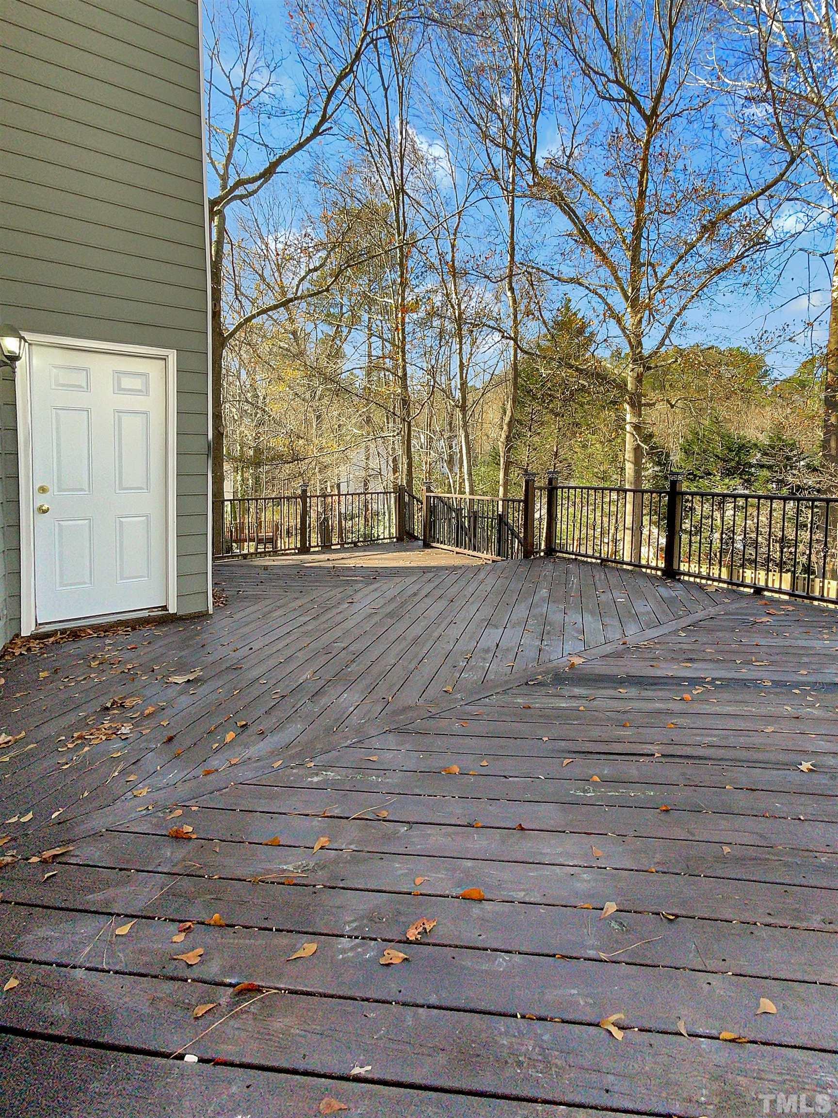 6017 Tarleton Court Raleigh, NC 27616 - Photo 21 of 26 a view of a yard with an outdoor space