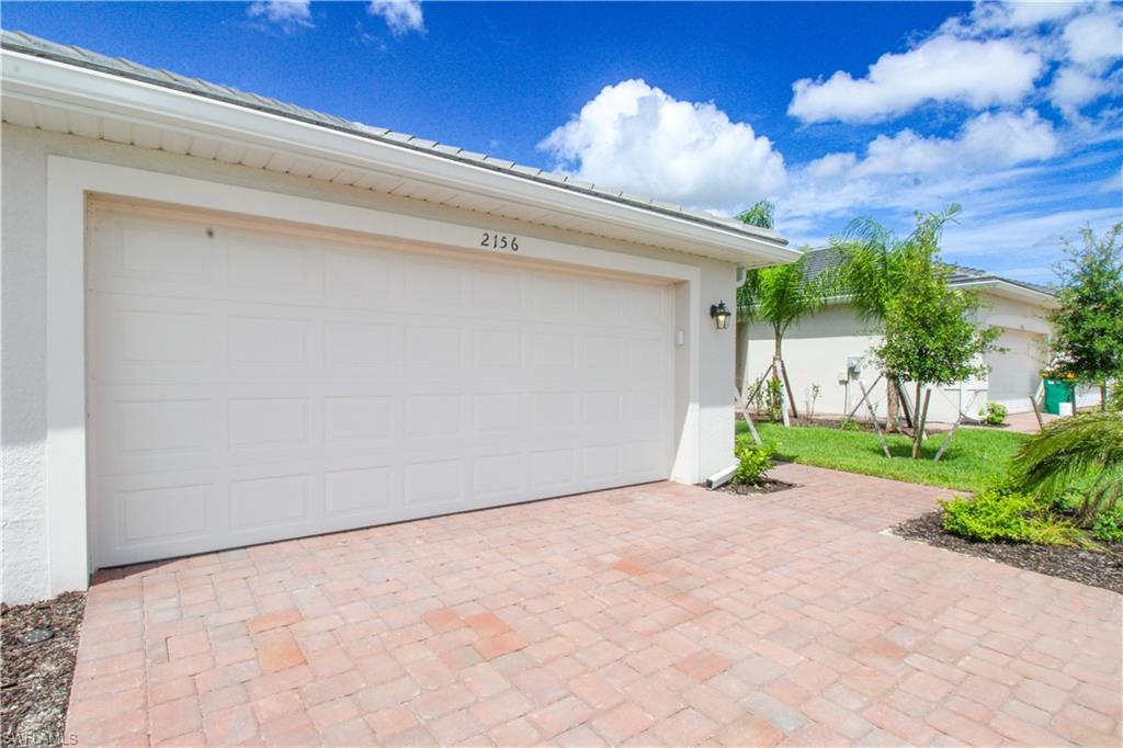 2156 Dragonfruit Way Naples, FL 34120 - Photo 12 of 50 View of garage