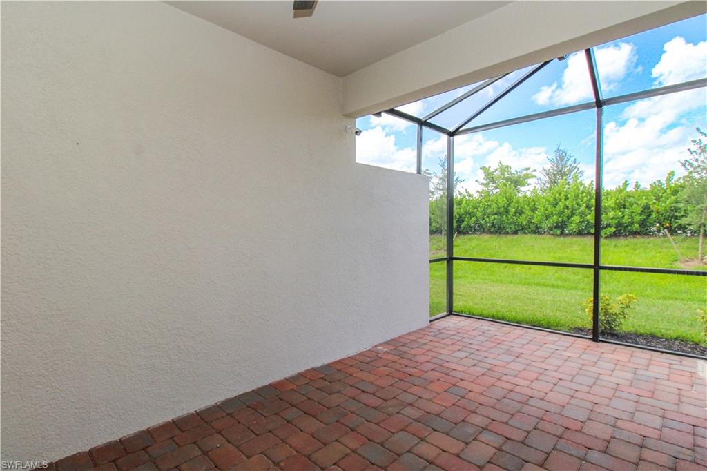 2156 Dragonfruit Way Naples, FL 34120 - Photo 14 of 50 View of unfurnished sunroom