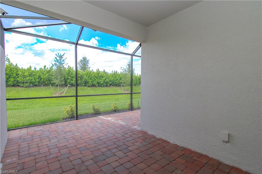 2156 Dragonfruit Way Naples, FL 34120 - Photo 15 of 50 View of unfurnished sunroom