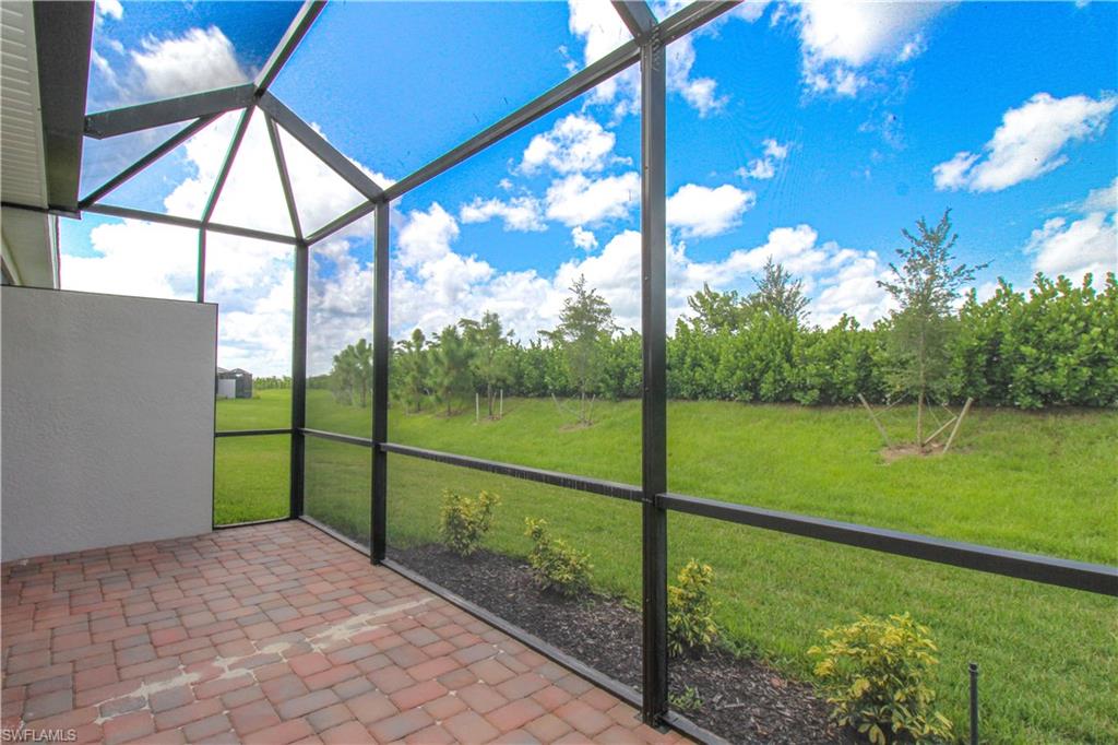 2156 Dragonfruit Way Naples, FL 34120 - Photo 20 of 50 View of unfurnished sunroom