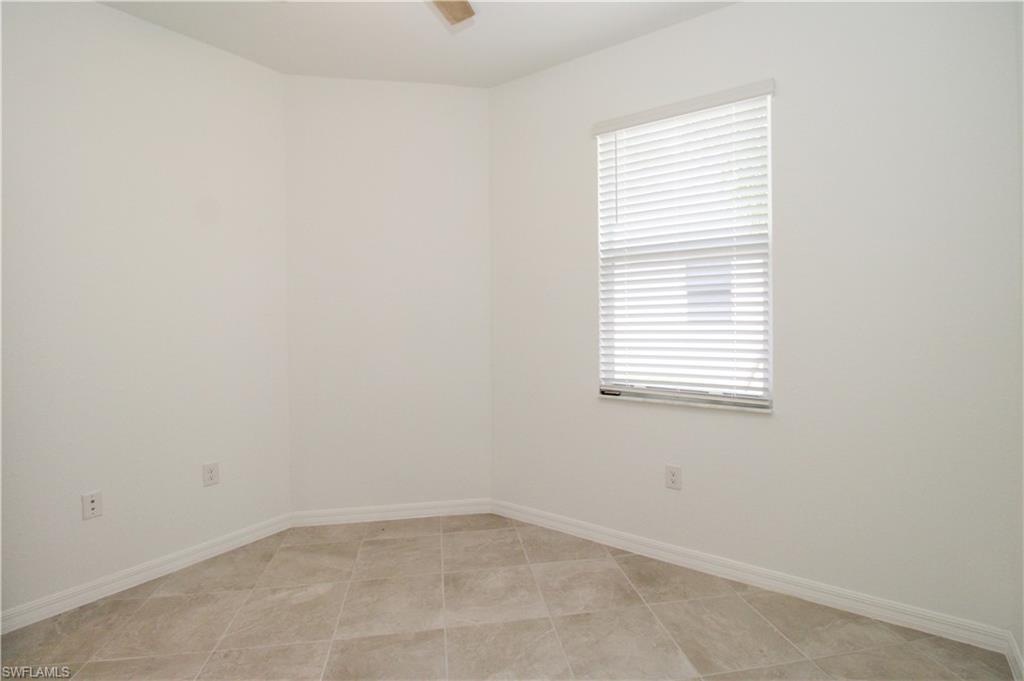 2156 Dragonfruit Way Naples, FL 34120 - Photo 28 of 50 Spare room featuring light tile patterned floors