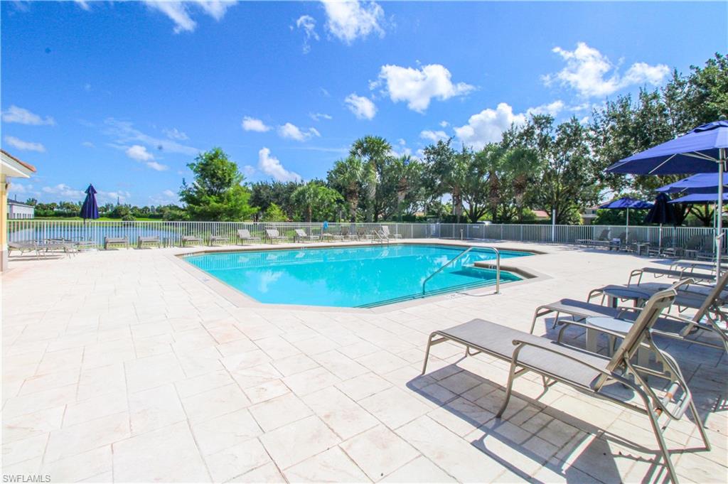 2156 Dragonfruit Way Naples, FL 34120 - Photo 3 of 50 View of pool featuring a patio