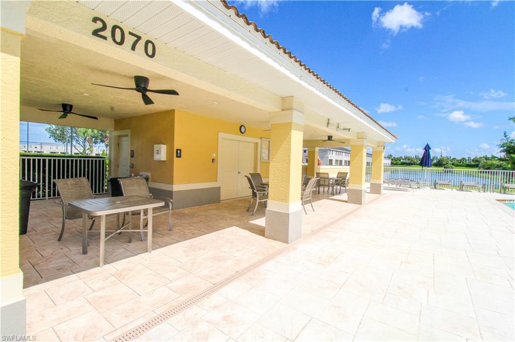 2156 Dragonfruit Way Naples, FL 34120 - Photo 4 of 50 View of patio with ceiling fan