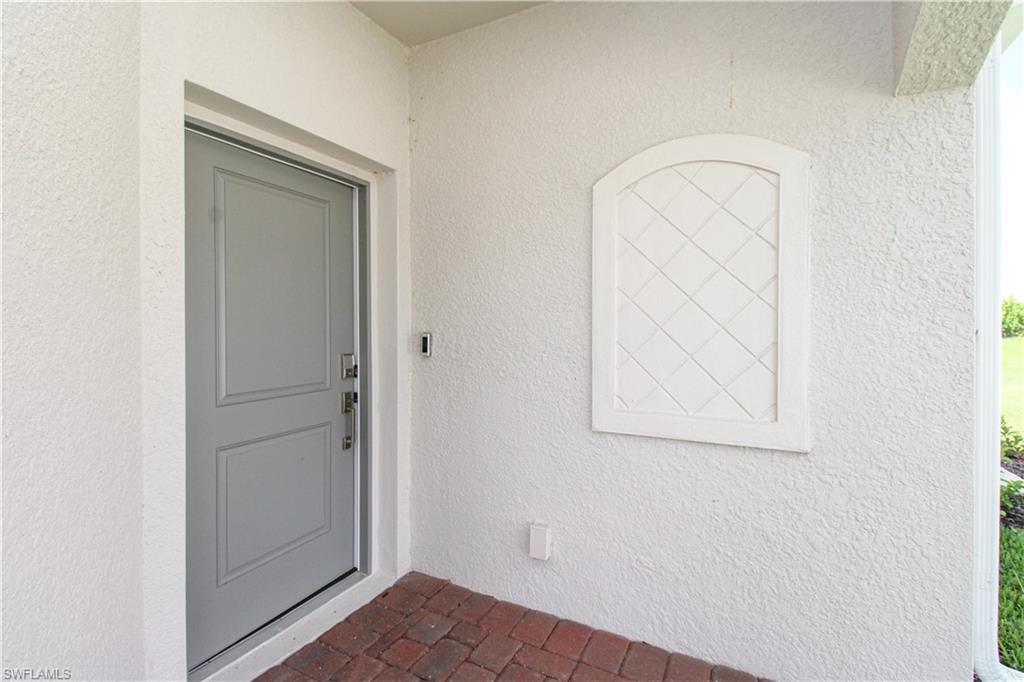 2156 Dragonfruit Way Naples, FL 34120 - Photo 7 of 50 View of doorway to property