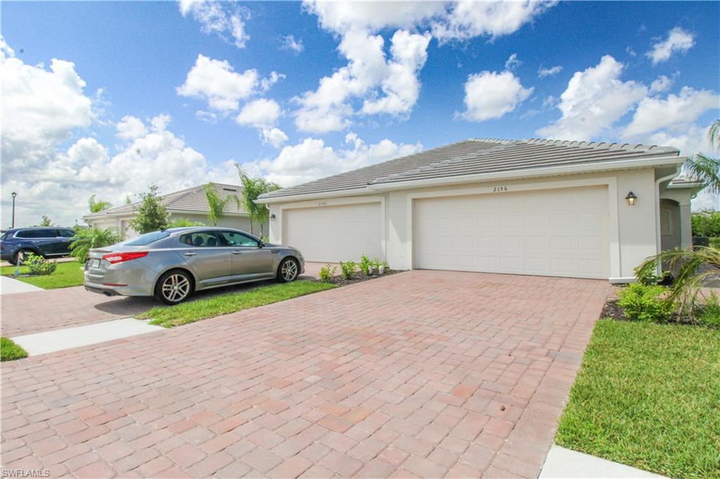 2156 Dragonfruit Way Naples, FL 34120 - Photo 10 of 50 View of front of house