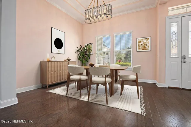 a view of a livingroom with furniture and wooden floor