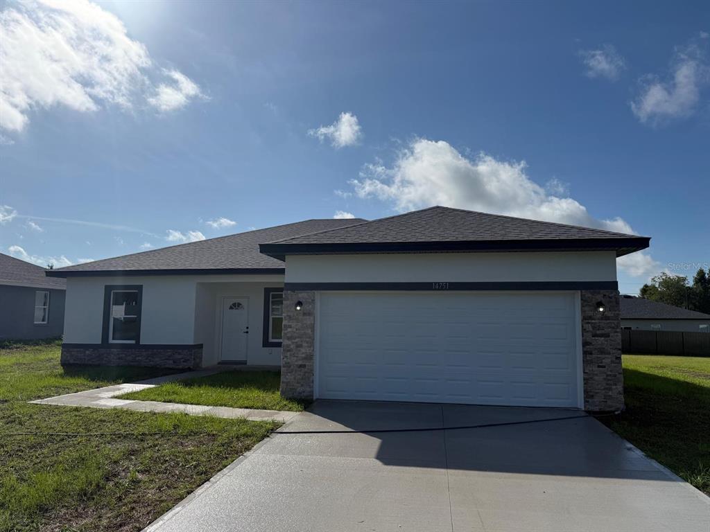 a house view with a garden space