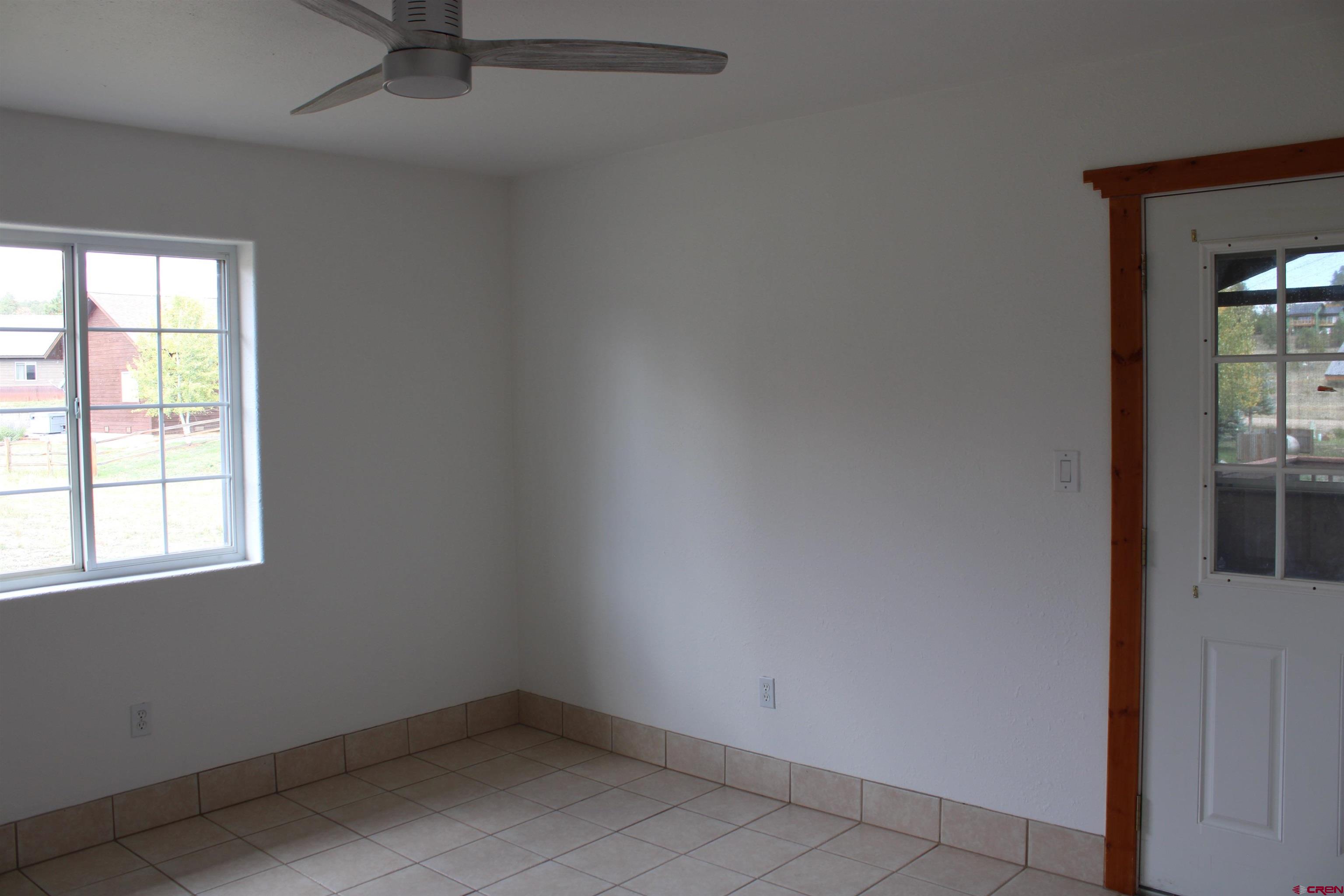 59 Rincon Court Pagosa Springs, CO 81147 - Photo 11 of 37 an empty room with a window