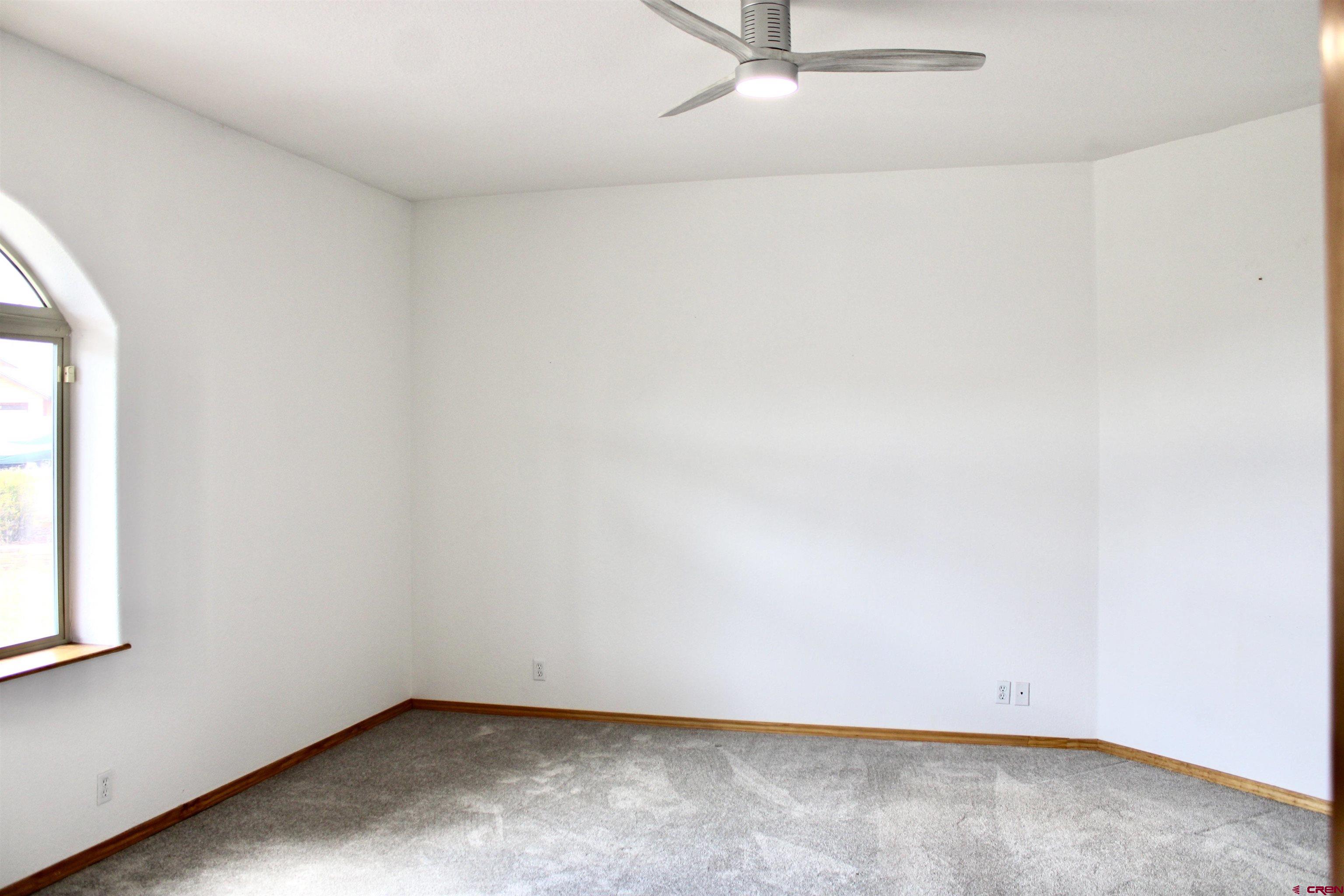 59 Rincon Court Pagosa Springs, CO 81147 - Photo 14 of 37 an empty room with a window