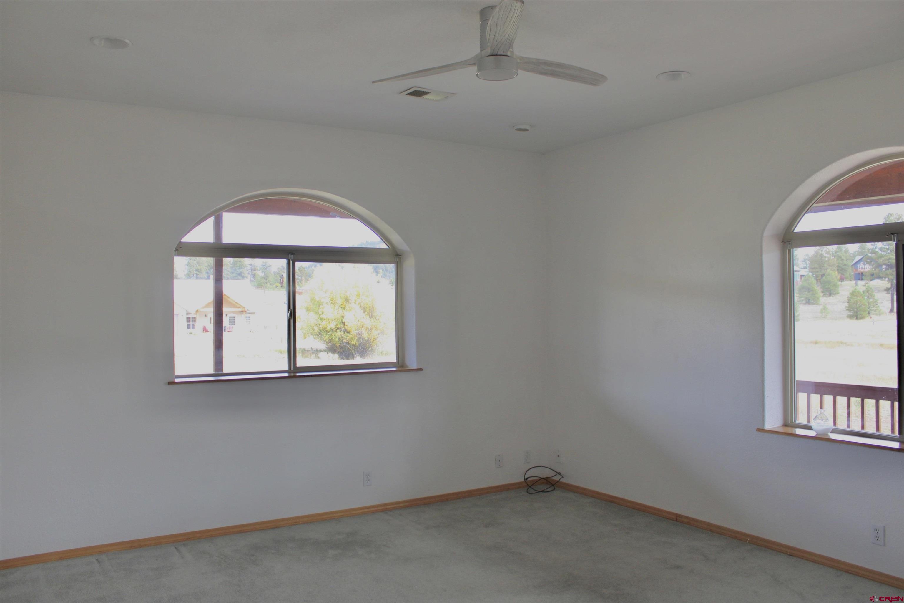 59 Rincon Court Pagosa Springs, CO 81147 - Photo 24 of 37 an empty room with a window