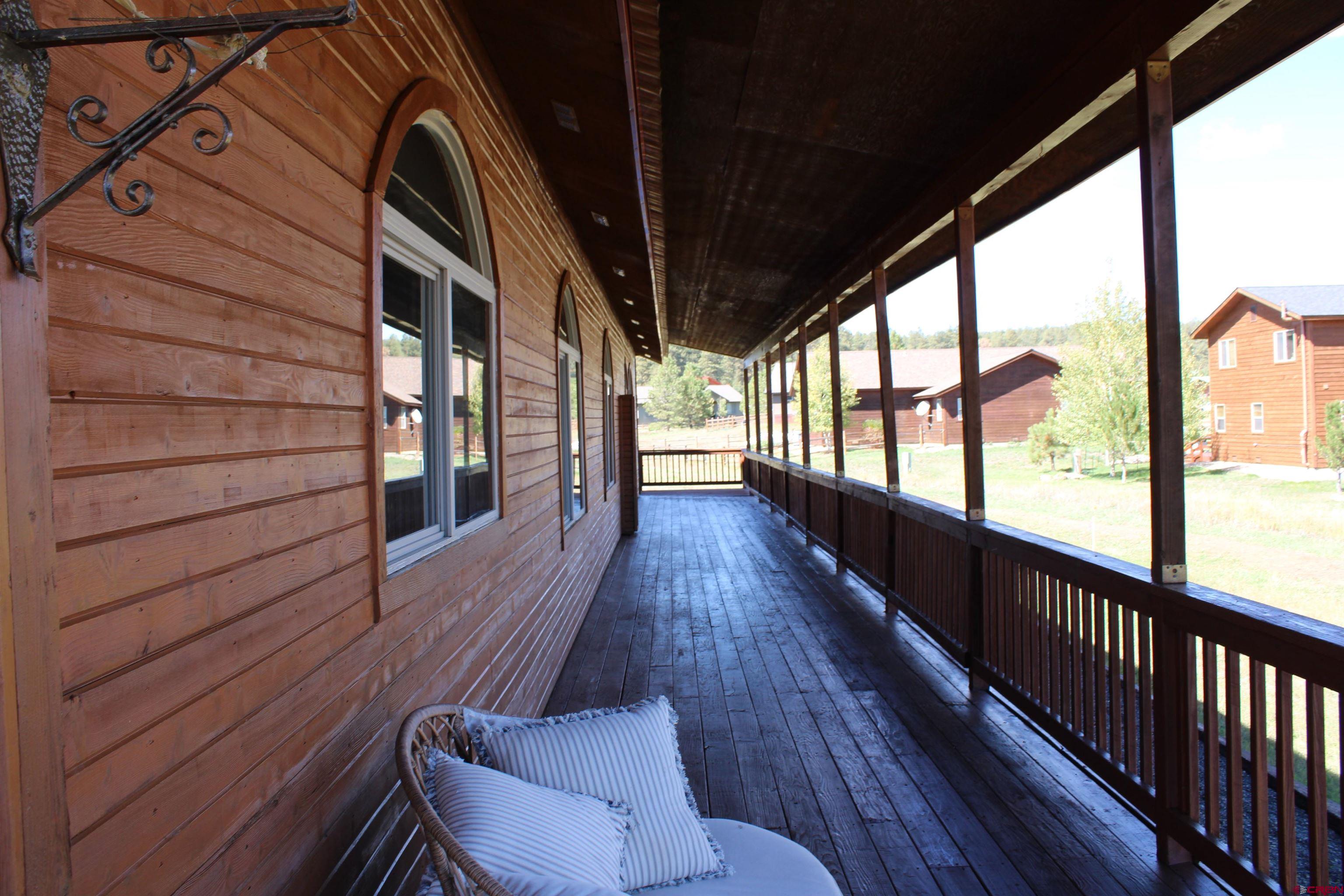 59 Rincon Court Pagosa Springs, CO 81147 - Photo 28 of 37 a view of a balcony with wooden floor