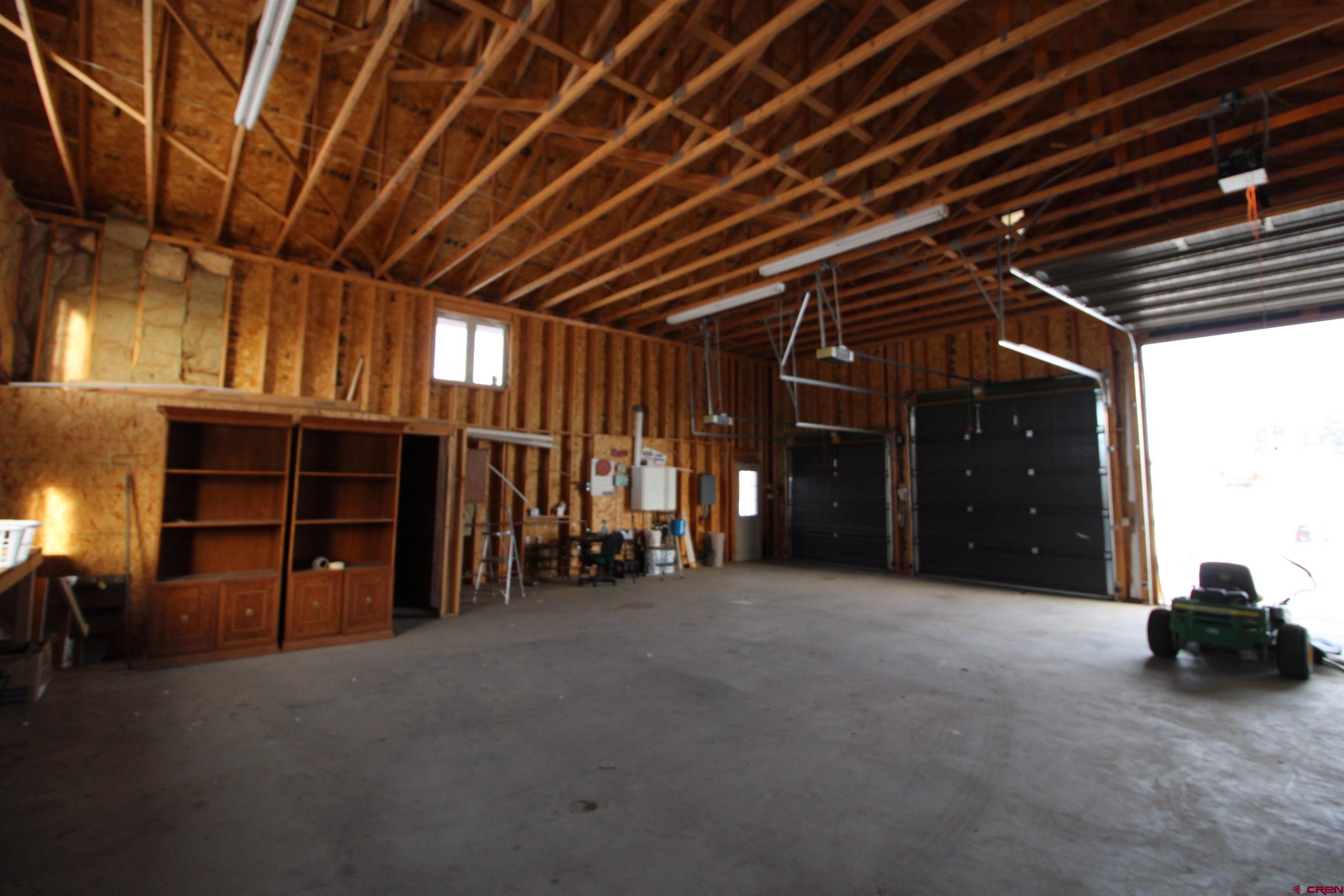 59 Rincon Court Pagosa Springs, CO 81147 - Photo 35 of 37 a view of a big room with air conditioner duct and materials on floor