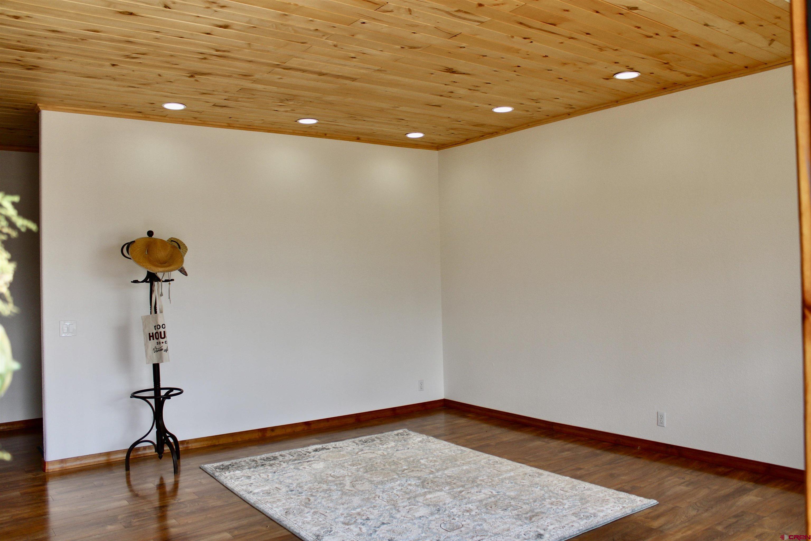 59 Rincon Court Pagosa Springs, CO 81147 - Photo 4 of 37 a view of a room with a sink and wooden floor