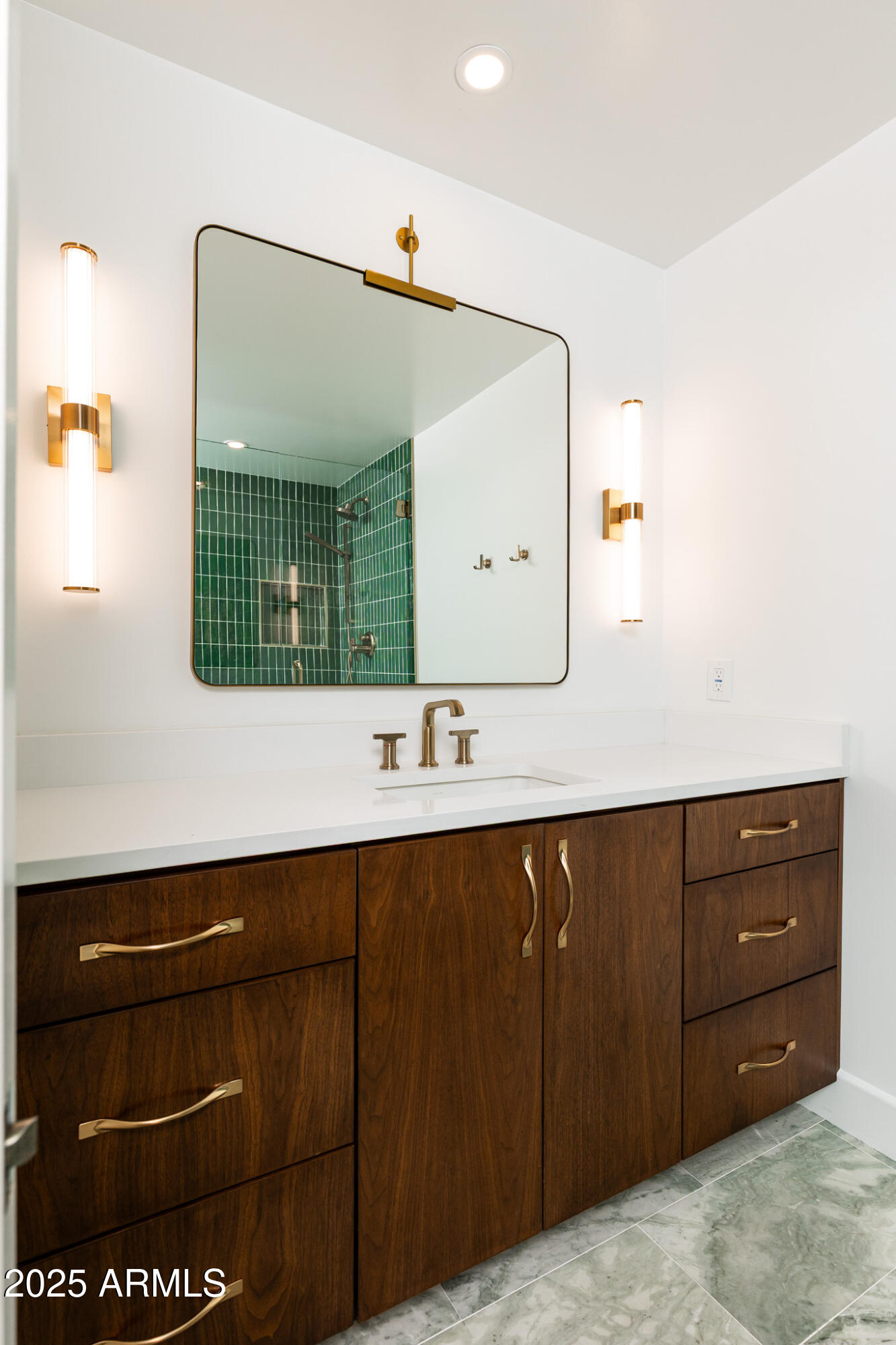 3736 East Montecito Avenue Phoenix, AZ 85018 - Photo 18 of 42 a bathroom with a sink and a mirror