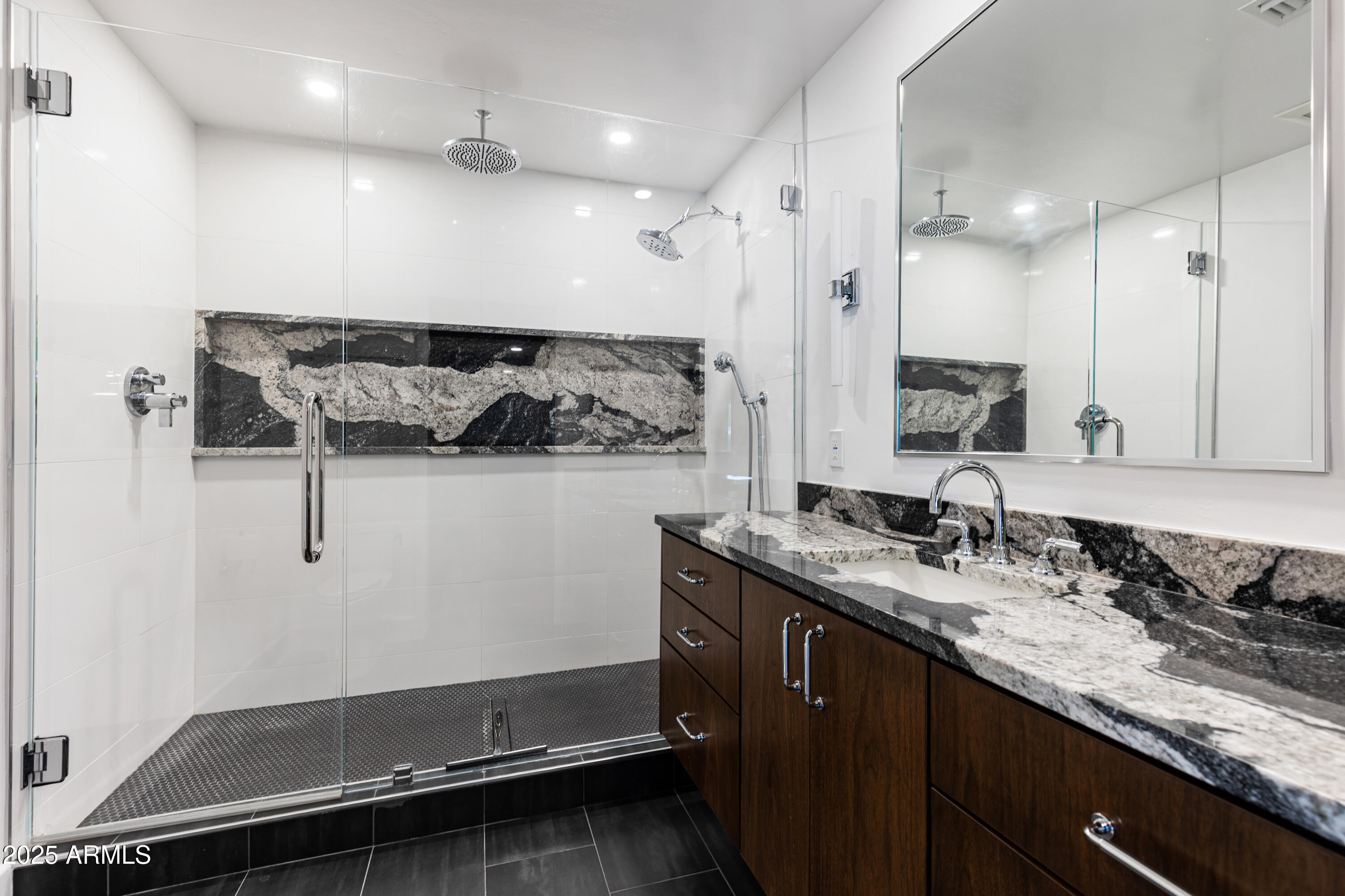 3736 East Montecito Avenue Phoenix, AZ 85018 - Photo 30 of 42 a bathroom with a granite countertop sink a mirror and shower