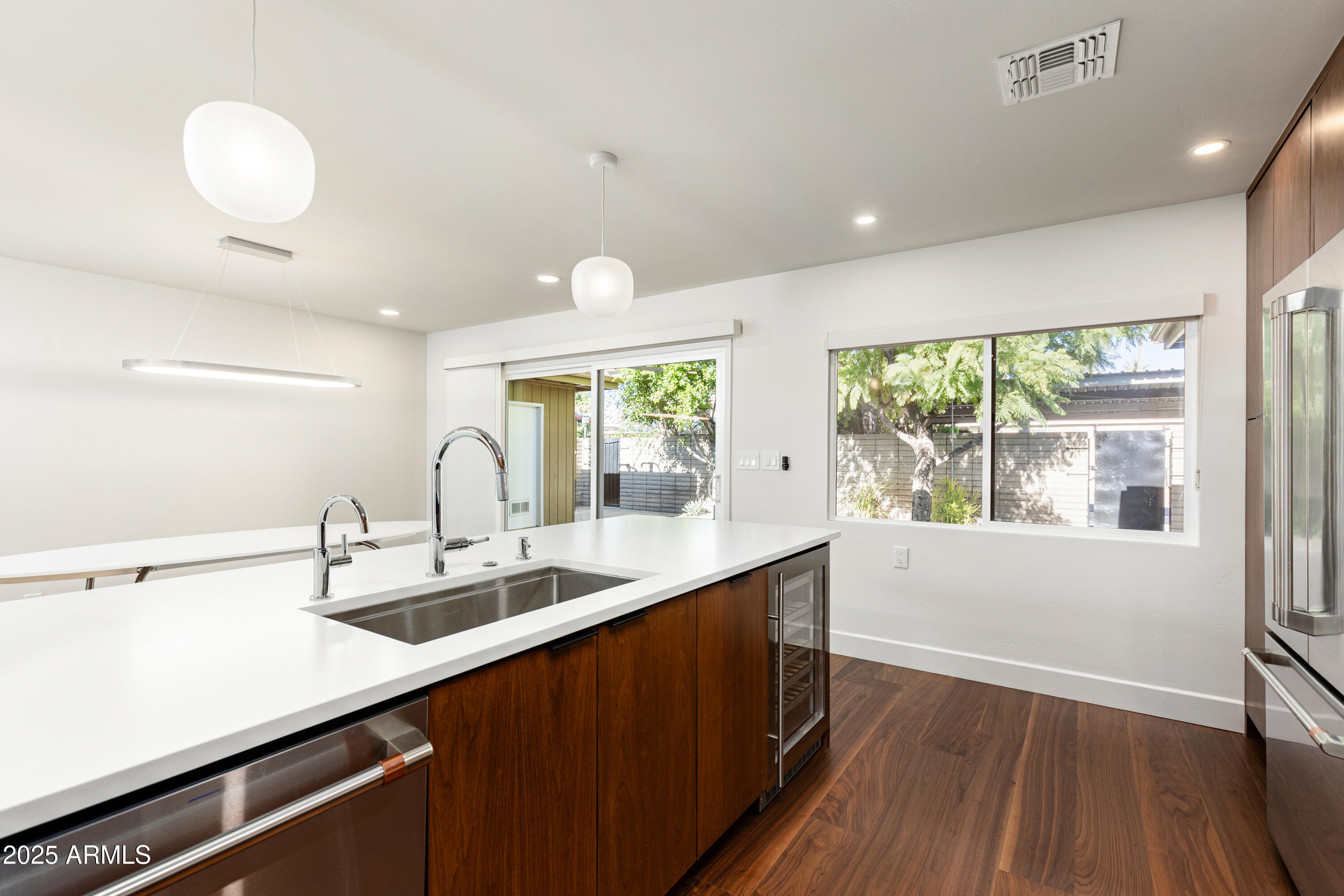 3736 East Montecito Avenue Phoenix, AZ 85018 - Photo 3 of 42 a kitchen with a sink and large window