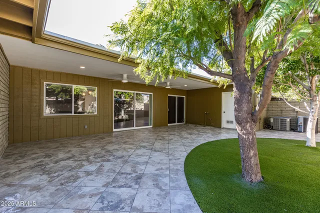a front view of a house with yard