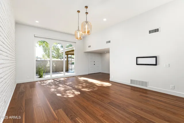 a view of an empty room and window