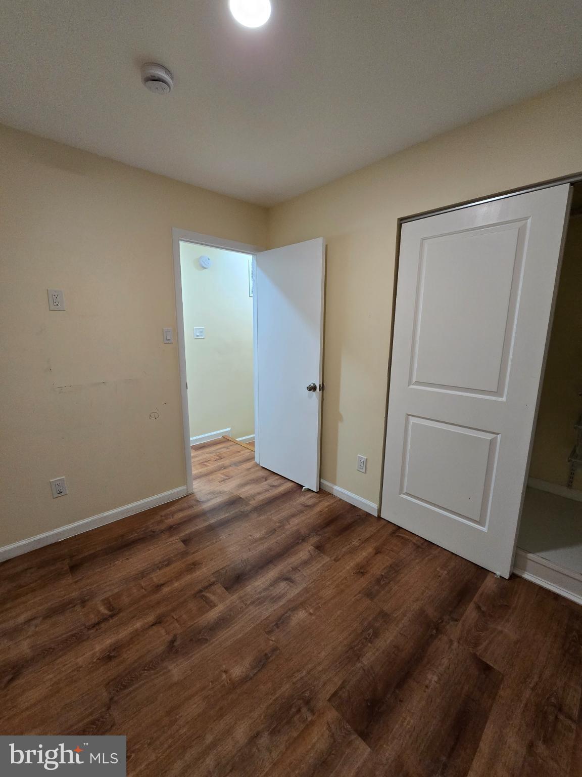 20000 Wyman Way Germantown, MD 20874 - Photo 13 of 56 a view of empty room with wooden floor