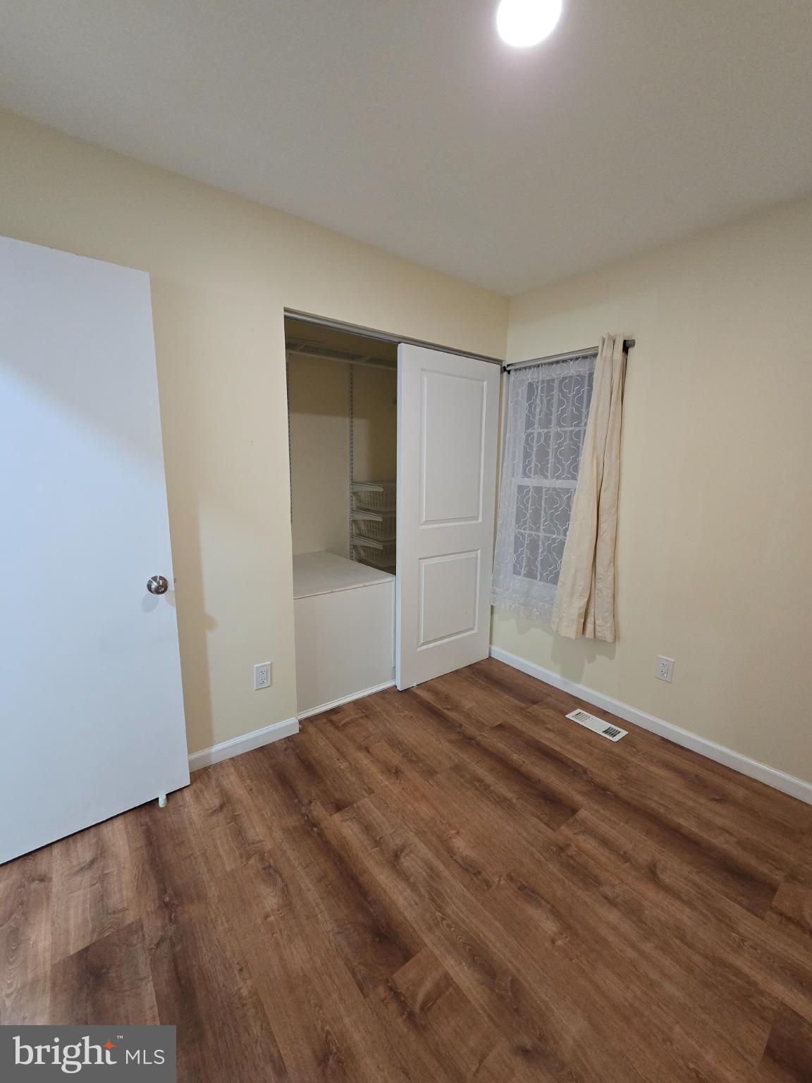 20000 Wyman Way Germantown, MD 20874 - Photo 16 of 56 a view of empty room with wooden floor