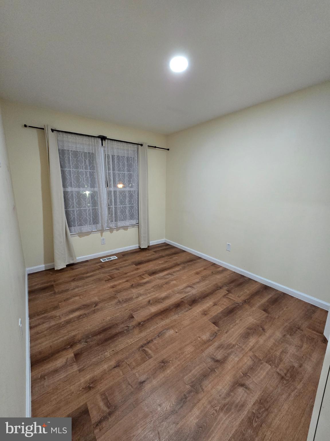 20000 Wyman Way Germantown, MD 20874 - Photo 20 of 56 a view of empty room with wooden floor