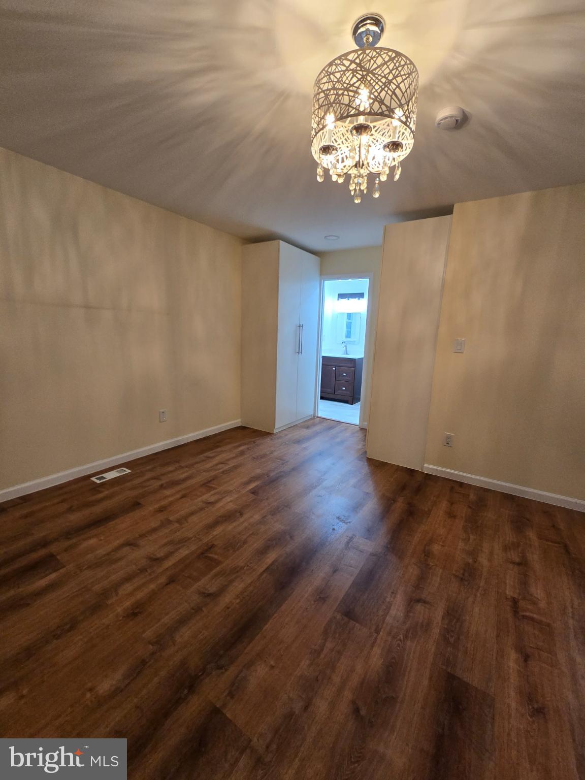 20000 Wyman Way Germantown, MD 20874 - Photo 24 of 56 a view of a chandelier fan and wooden floor