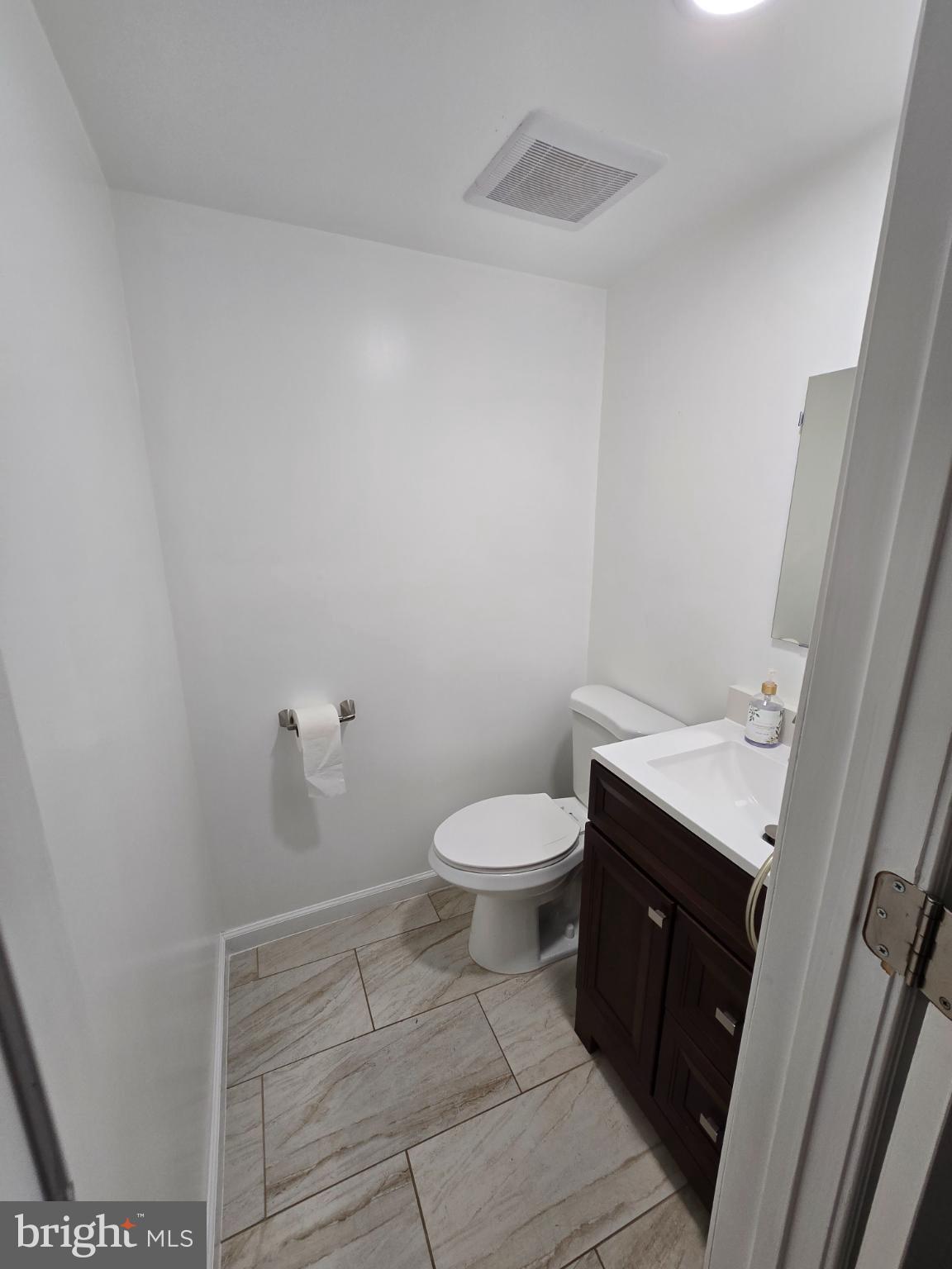 20000 Wyman Way Germantown, MD 20874 - Photo 30 of 56 a bathroom with a toilet and a sink