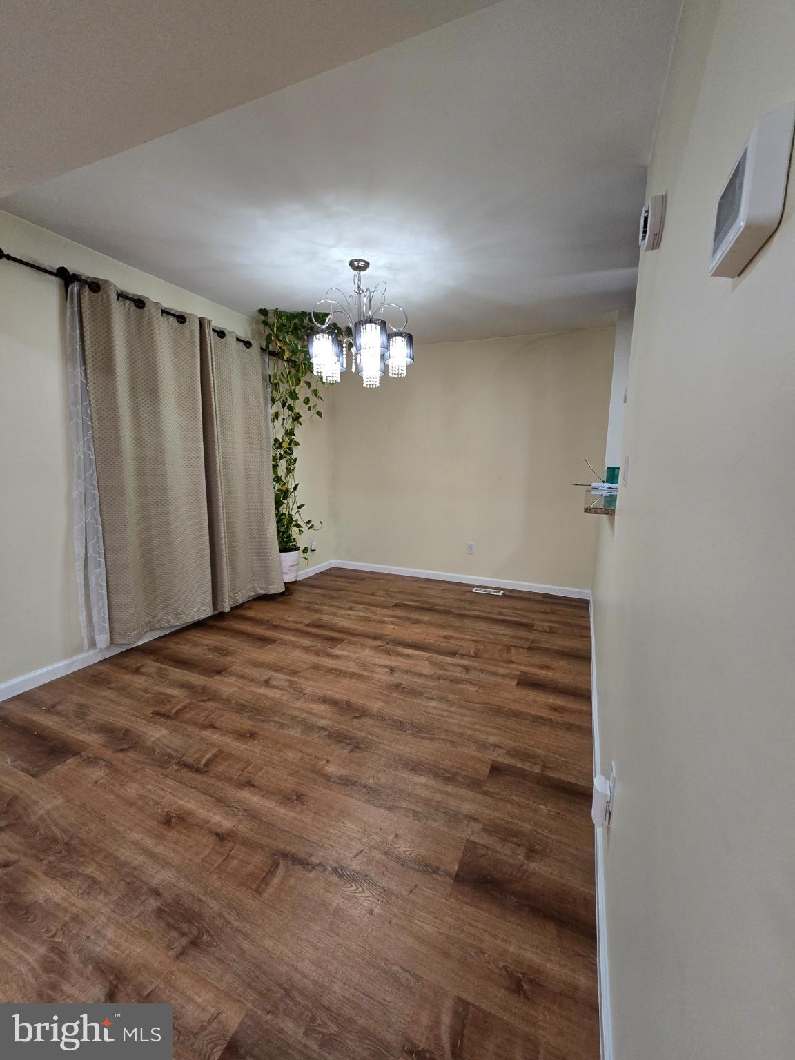 20000 Wyman Way Germantown, MD 20874 - Photo 32 of 56 a view of a room with wooden floor