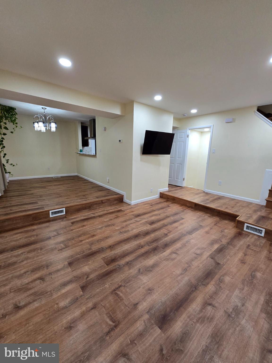 20000 Wyman Way Germantown, MD 20874 - Photo 36 of 56 a view of empty room with wooden floor