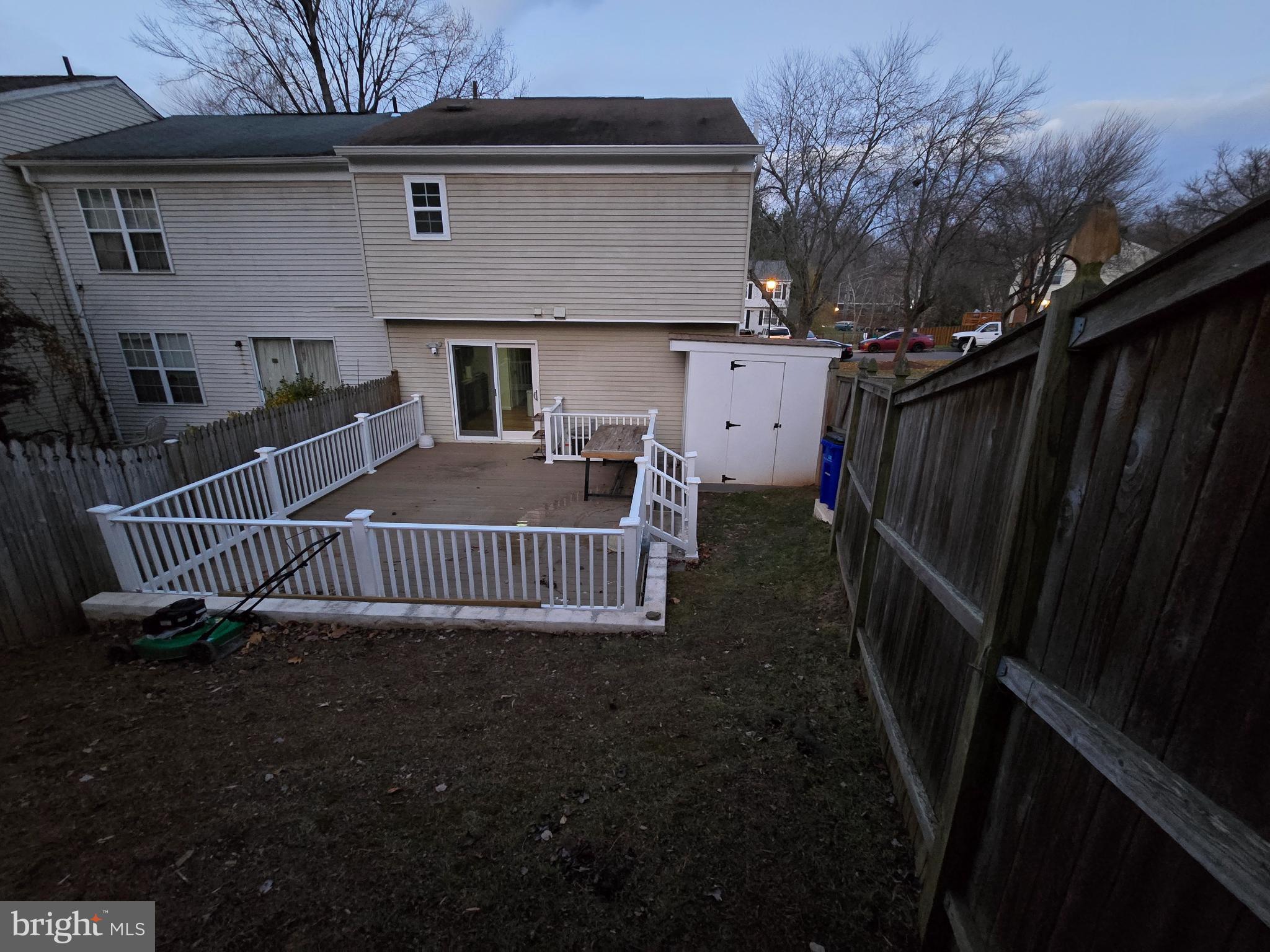20000 Wyman Way Germantown, MD 20874 - Photo 46 of 56 a view of a house with a deck and a yard