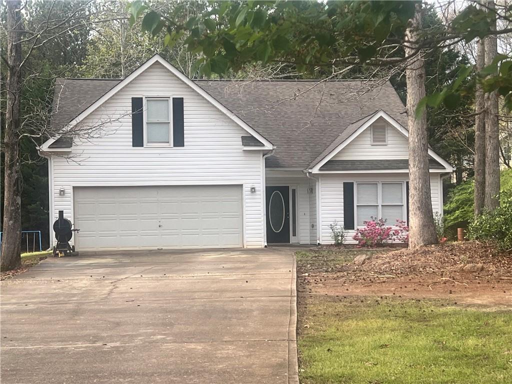 355 Freeman Drive Covington, GA 30016 - Photo 1 of 1 a front view of a house with a yard
