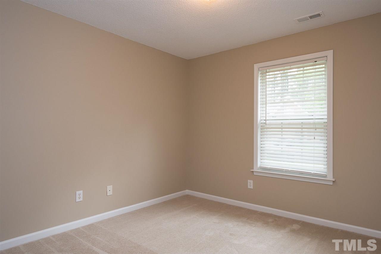 3809 Toyon Drive Raleigh, NC 27616 - Photo 16 of 20 an empty room with a window