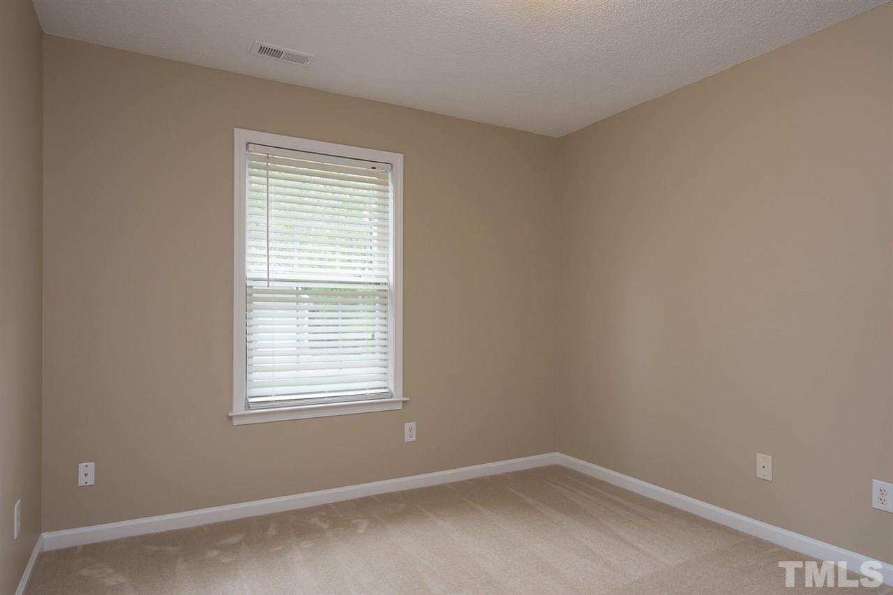 3809 Toyon Drive Raleigh, NC 27616 - Photo 18 of 20 an empty room with a window