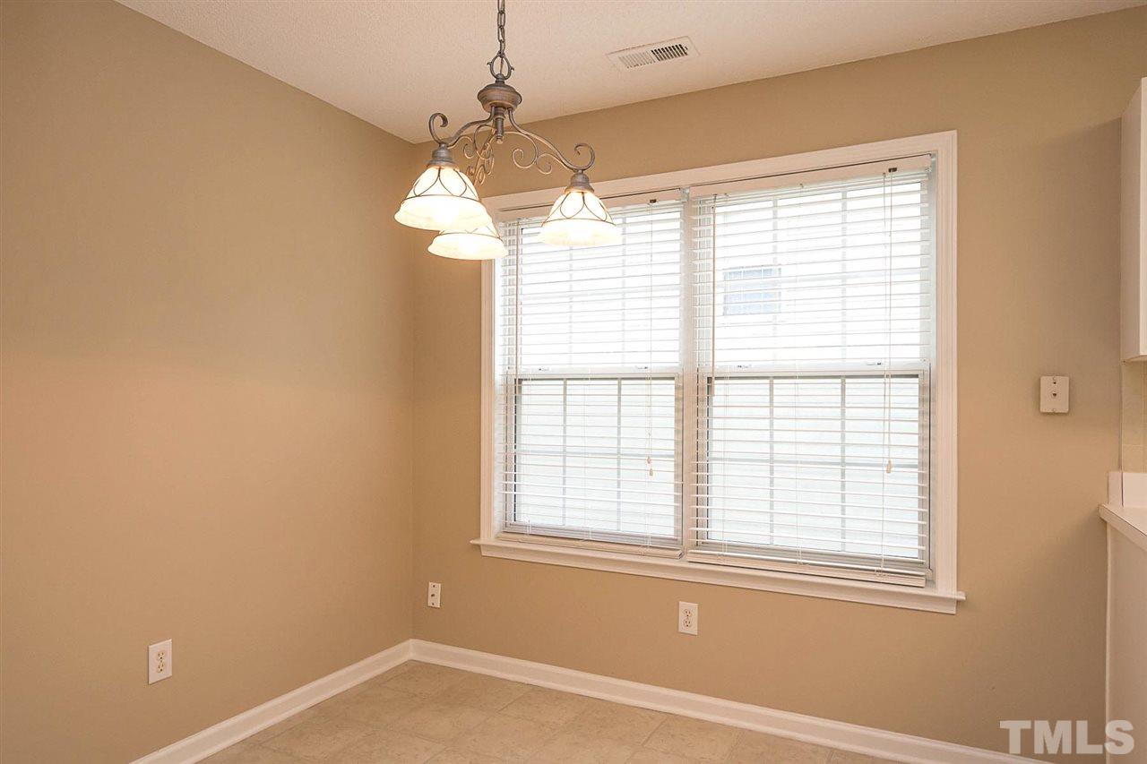 3809 Toyon Drive Raleigh, NC 27616 - Photo 5 of 20 a view of an empty room with a window