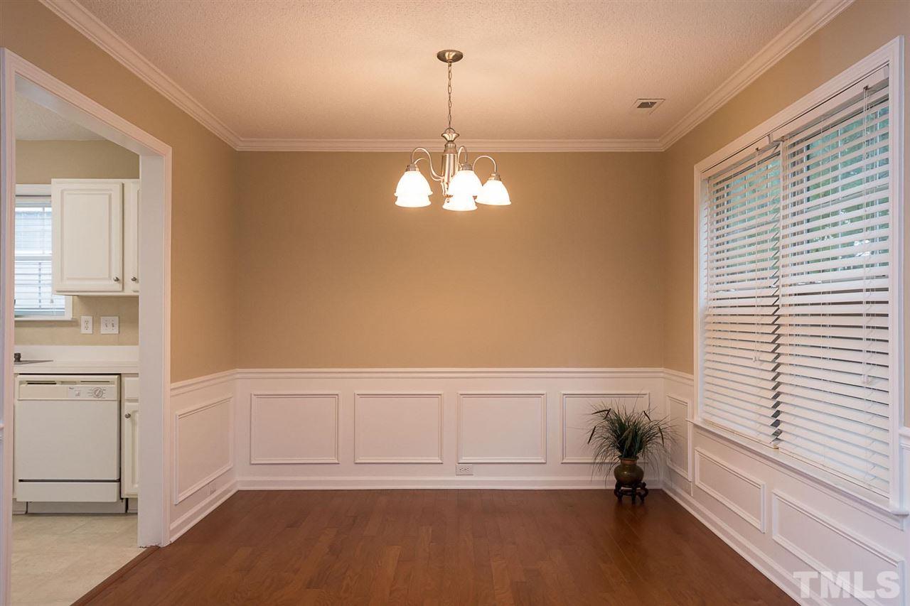 3809 Toyon Drive Raleigh, NC 27616 - Photo 10 of 20 a view of a livingroom with wooden floor and a window