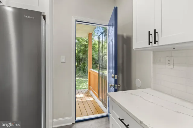 a view of a bedroom from the hallway