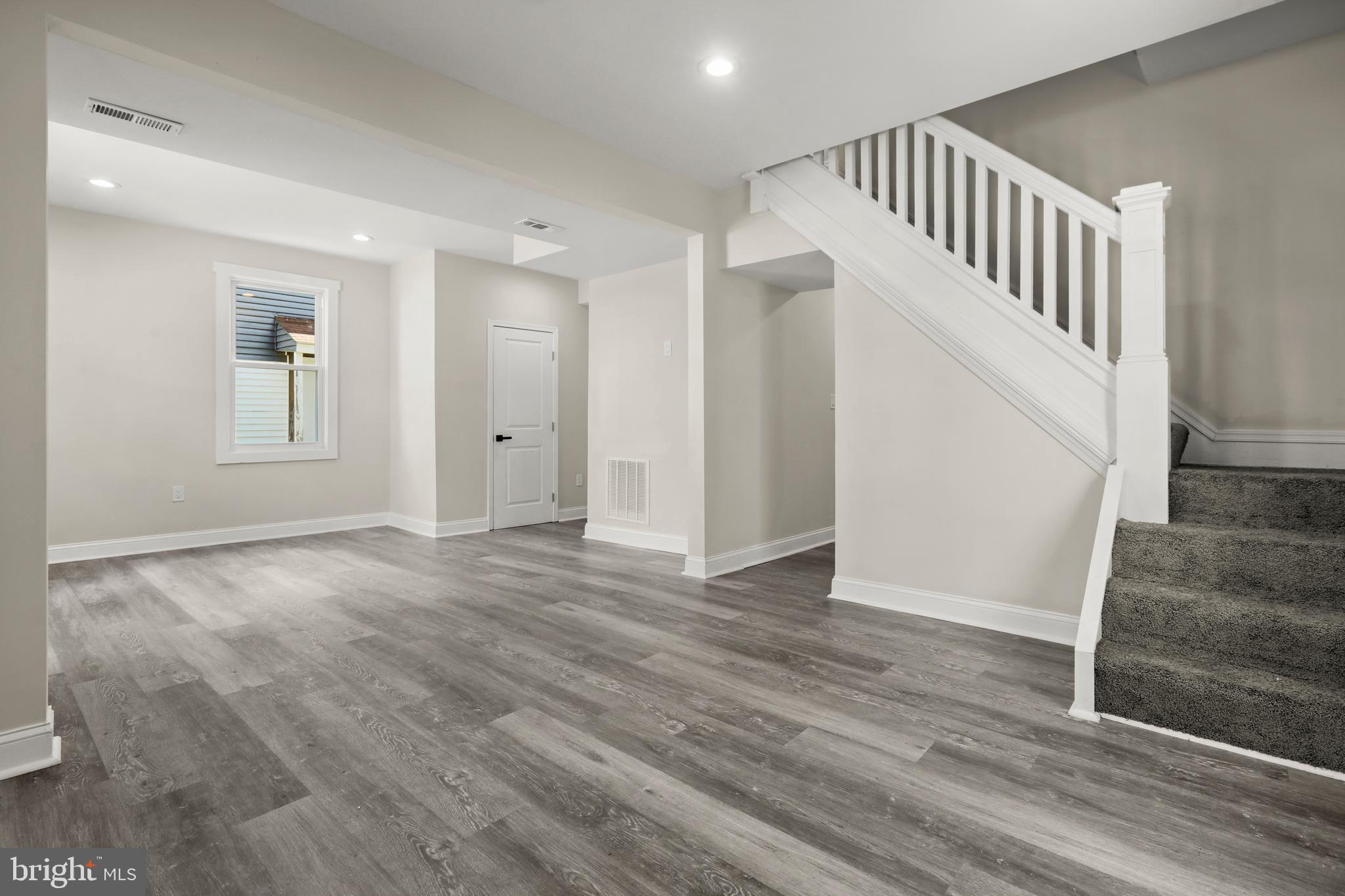 505 McCabe Avenue Baltimore, MD 21212 - Photo 10 of 46 a view of an entryway with wooden floor