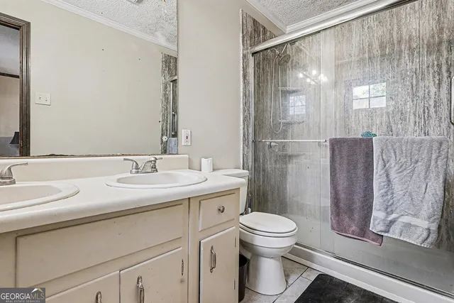 a bathroom with a sink and a toilet