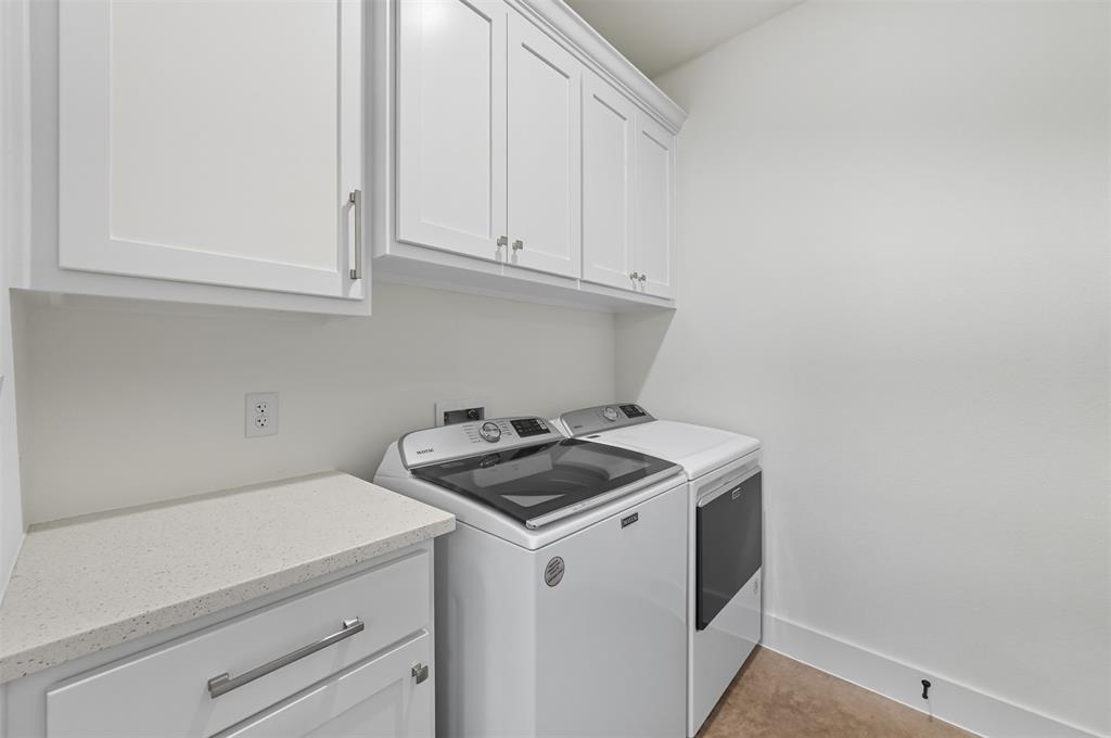 104 Cardinal Wds Granbury, TX 76049 - Photo 21 of 23 Washroom with independent washer and dryer, cabinet space, and light tile patterned floors