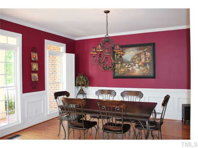 5101 Bartons Enclave Lane Raleigh, NC 27613 - Photo 3 of 25 Crown Molding, Chair Rail and Picture Frame Molding Enhances this Dining Room! Dining Room