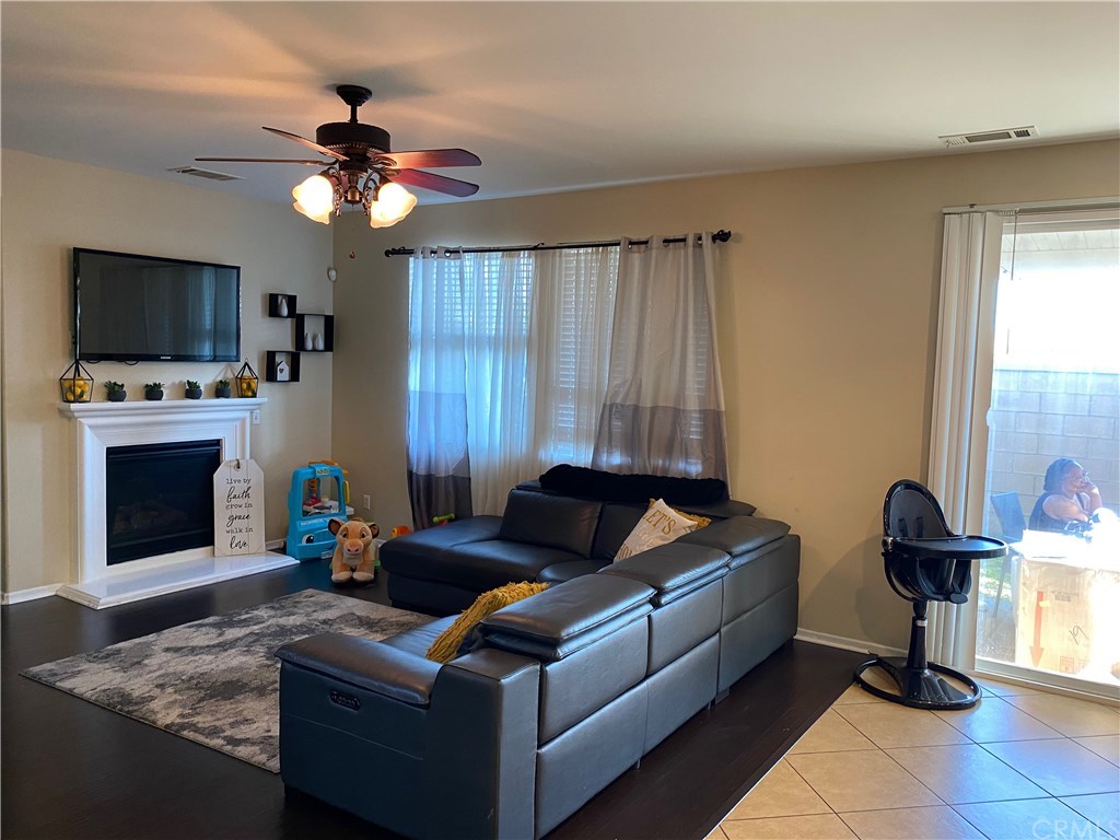 537 Kennedy Street Rialto, CA 92376 - Photo 11 of 32 Family room with Fire place off of Kitchen