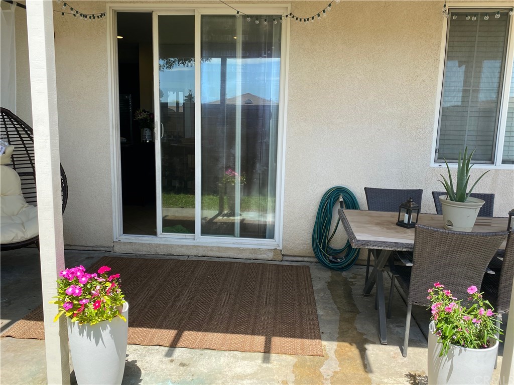 537 Kennedy Street Rialto, CA 92376 - Photo 29 of 32 Backyard Patio lounge area