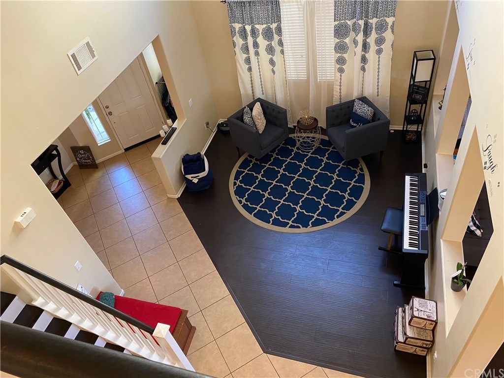 looking down on Foyer and Formal Living Room
