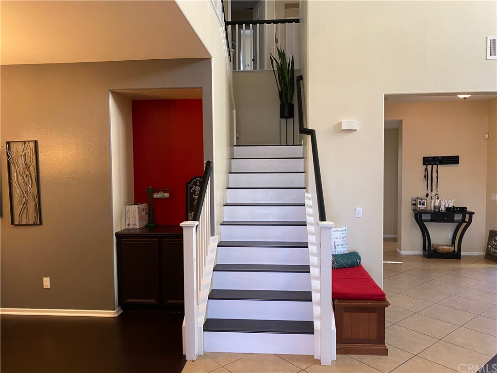 537 Kennedy Street Rialto, CA 92376 - Photo 9 of 32 Stairway with Dining Room Bar area.