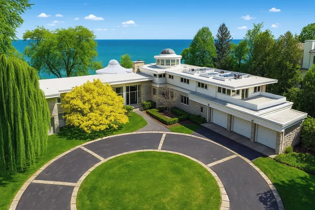 an aerial view of a house with a garden