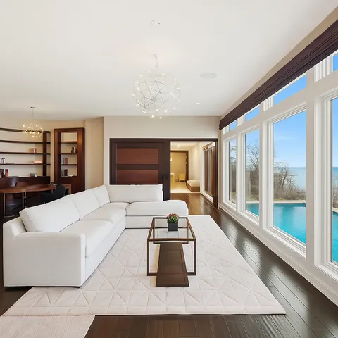 a view of kitchen with stainless steel appliances granite countertop cabinets and a refrigerator