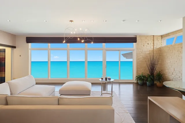 a large room with lots of counter space and windows