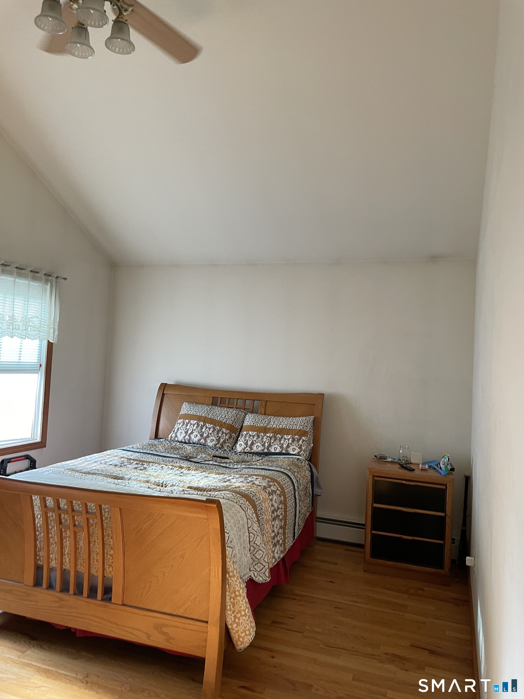 112 Maple Street Seymour, CT 06483 - Photo 16 of 34 Primary bedroom offers cathedral ceiling, hardwood floors and full bath